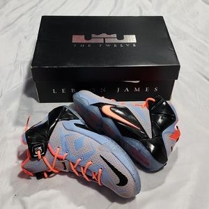 Youth size 6. LEBRON XII (GS). color listed: ALUMINUM/SUNSET GLOW-BLACK-HOT LAVA